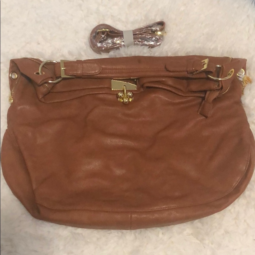 Brown and gold purse with strap